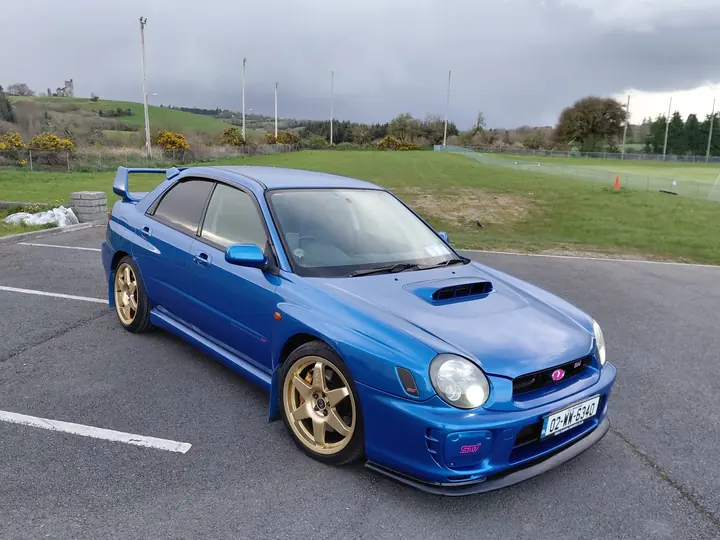 Tom Dempsey's blue Subaru Impreza